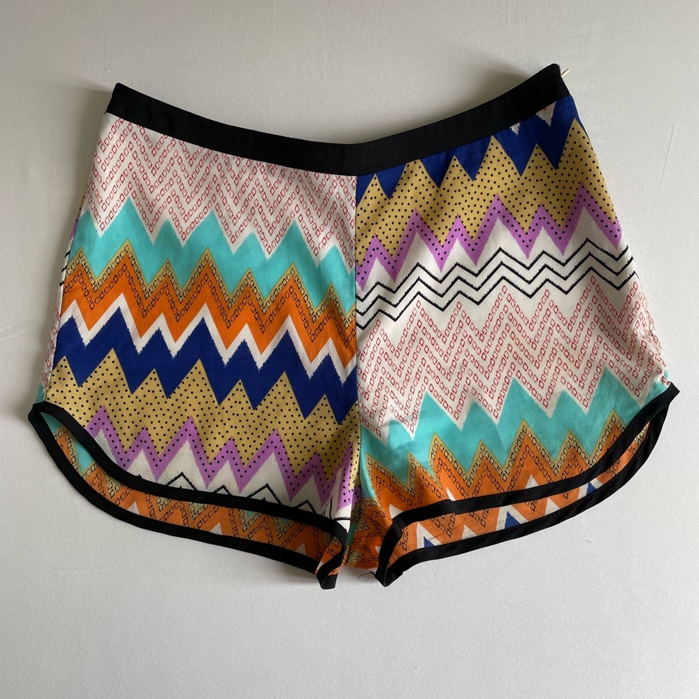 Lush Orange and Blue Athletic Shorts with Zigzag Pattern